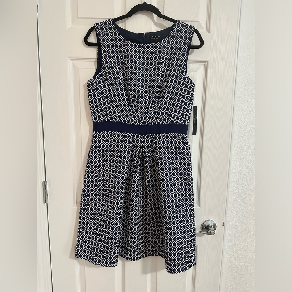 Tahari dress, sleeveless, lined, color white and blue, Size 8.
